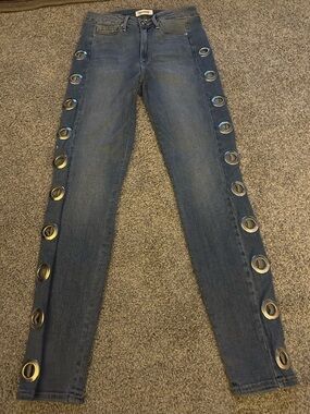 Good American Blue Skinny Jeans with Large Metal Grommets